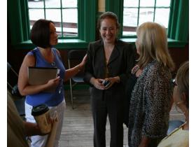 From left, Sandee French, Jennifer Coe and Linda French exchange ideas after the DDA meeting. 
