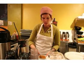 Bee Mayhew, owner of Beezy's Cafe at 20 N. Washington St. dishes up some vegan soup for a customer. Beezy's opened its doors Nov. 10
