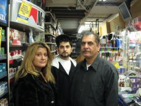 Cathy Hanna, her son Brian and husband Samir own Brandy's Liquor Shoppe on Michigan Avenue and Summit Street. The owners are talking with the city while defending against a nuisance suit.