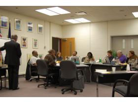 Michigan Association of School Boards' Dr. Michael Emlaw, left, helped the Ypsilanti School Board narrow its superintendent search from 17 to seven at Monday evening's meeting.